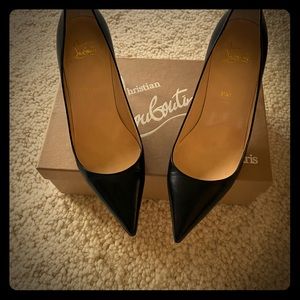 Christian Louboutin size 39 1/2 , slightly worn.
